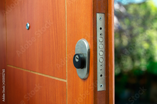 Open Door Of A Family Home Close Up Of The Lock An Armored