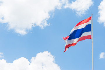 Thai flag waving on blue sky