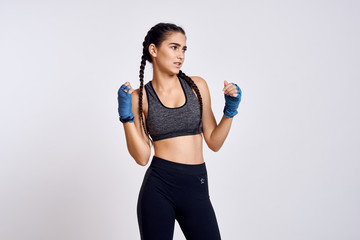 Naklejka premium young woman with dumbbells