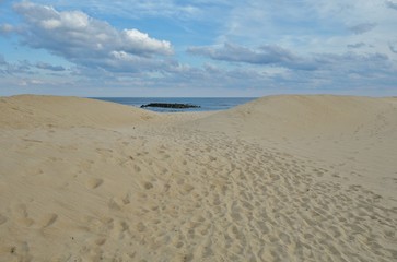 Fototapeta na wymiar View of the beach in Belmar, New Jersey, along the long Jersey Shore beach on the Atlantic Ocean 