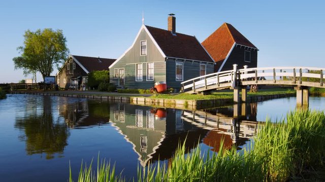 Museum in Zaanse Schans village on the water canal / Zaandam, North Holland, Netherlands. Shot with RED Weapon Helium 8K camera.