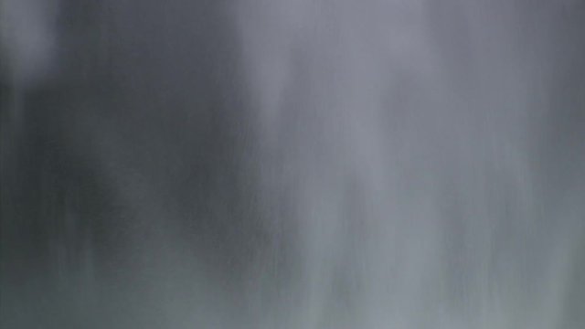 Close-up of cascade dropping over lip of Latourell Falls in Columbia Gorge, Oregon