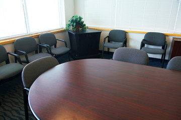 Close up on meeting room with meeting table and chairs