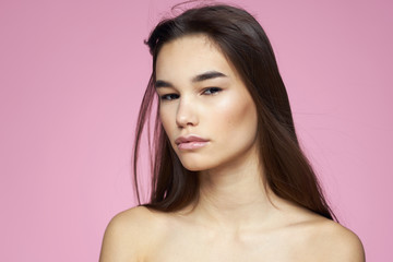 young woman on pink background