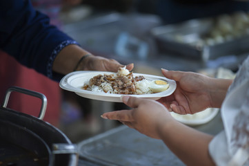 The society of helping to share food to the poor