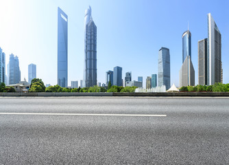 empty asphalt road with city skyline background in shanghai,China