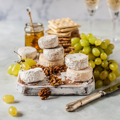 Variety of French Cheeses in a Dusty Pantry
