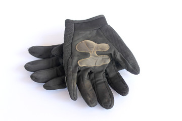 dirty old black gloves.