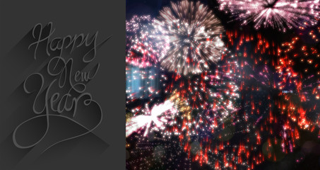 Classy new year greeting against colourful fireworks exploding on black background