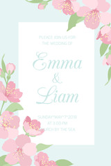 Wedding event invitation card template. Pink cherry sakura tree blossom blooming flowers border frame with decorated corners on blue white background. Text placeholder. Vertical portrait aspect ratio.