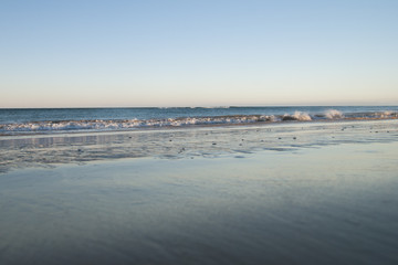 Fototapeta na wymiar Sea waves on a beach ocean background in sunny day