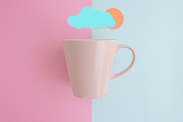 Minimal flat lay concept of pink coffee cup on the colorful background with copy space