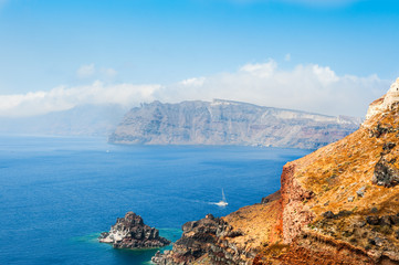 Fototapeta na wymiar Coast of Santorini island, Greece. Summer landscape, sea view