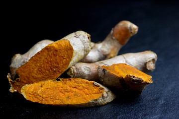 Turmeric  isolated on back background
