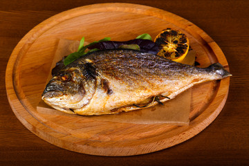 Grilled dorada with lemon