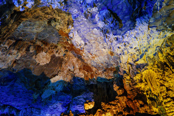 Colorful inside of Hang Sung Sot cave world heritage site in Halong Bay, Vietnam