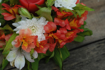 Bouquet of Flowers alstromeria Astromeria Beautiful Arrangement Isolated rustic Wooden Background