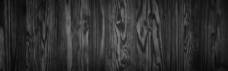 Black wood texture, empty wooden table surface or wall as background
