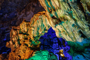 Colorful inside of Hang Sung Sot cave world heritage site in Halong Bay, Vietnam