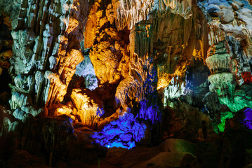 Colorful inside of Hang Sung Sot cave world heritage site in Halong Bay, Vietnam