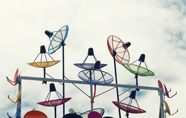 Bright colorful satellite dish on the roof of the residence.