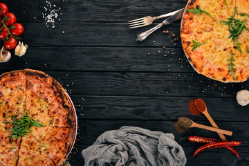 Pizza formaggi. Mozzarella, parmesan cheese. Top view. On a wooden background. Copy space.