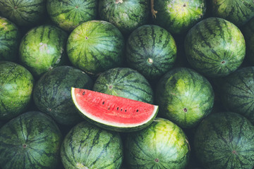 Fresh red slice watermelon on the heap - obrazy, fototapety, plakaty