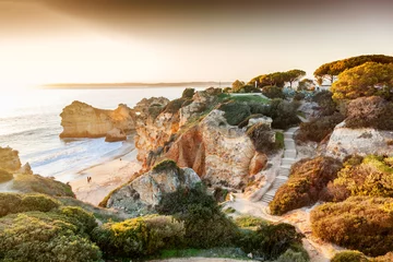 Poster Atlantic coast at sunset, Algarve, Portugal. Stunning beautiful landscape © olezzo