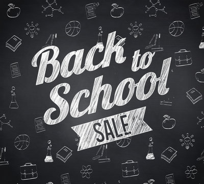 Composite image of back to school sale message against blackboard