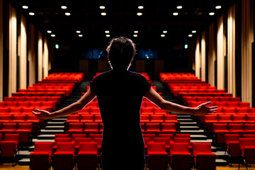 Young actor in a theater.