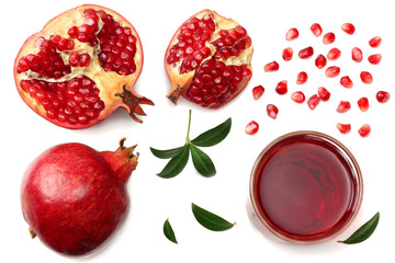 Pomegranate juice with pomegranate isolated on a white background top view