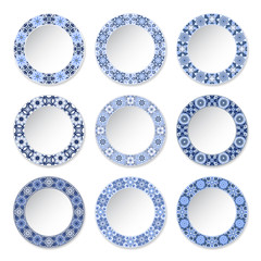 Set of decorative plates with a circular blue pattern, top view. White background. Vector illustration.