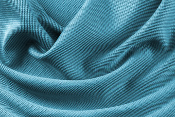Blauer Luxus Stoff seidige Gewebe Struktur Glanz Stoff Material Textur mit Falten Macro Closeup Textur
