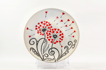 Decorative ceramic dish painted with hands. Art, handmade.