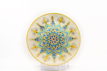Decorative ceramic dish painted with hands. Art, handmade.