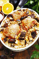 Chicken thigh baked with rice, eggplant and figs