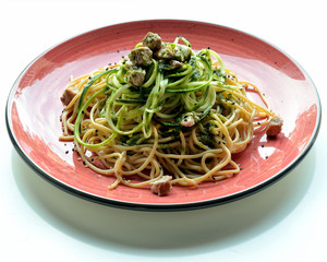 Red lentil spaghetti with iberian secret