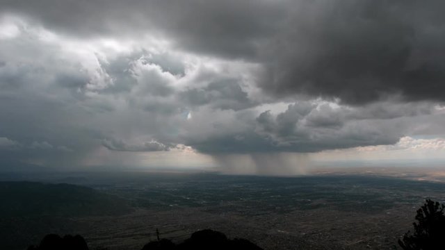 Desert rainstorm seen from mountaintop, time lapse