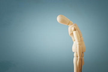 violence cincept. sad wooden dummy.