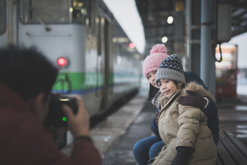 Fototapeta premium Photographer taking photo of Asian childre