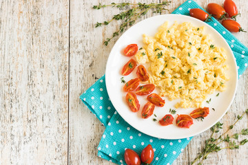 Omelette and fried tomatoes for breakfast