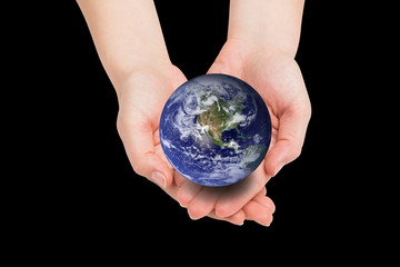 Hands presenting against earth