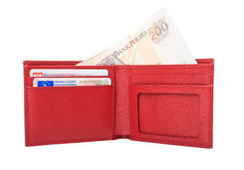 Wallet with polish zloty isolated on white.