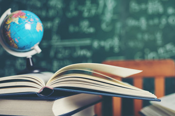  book with green board background