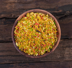 Indian Namkeen Food Navratan Mixture or Navratna Mix Namkeen Also Know As Nimco, Namkin, Mixture or Nimko on Wooden Background