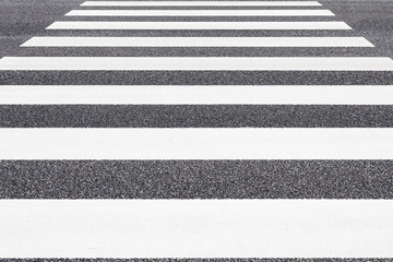 Fototapeta premium Close - up Zebra crossing pattern on city road
