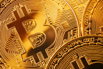 shiny golden bitcoins pattern, gold money wallpaper. digital currency, bit coin close up, cryptocurrency concept.space for text, digital money investment. technology  network currency