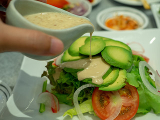 mixed salad cut into small pieces brought into the skin of an avocado