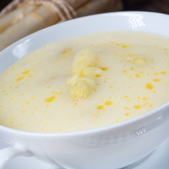 rustic white asparagus cream soup with butter