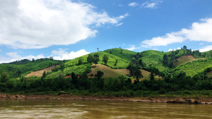 Fototapeta na wymiar Mekong River impressions during slow boat tour in Laos